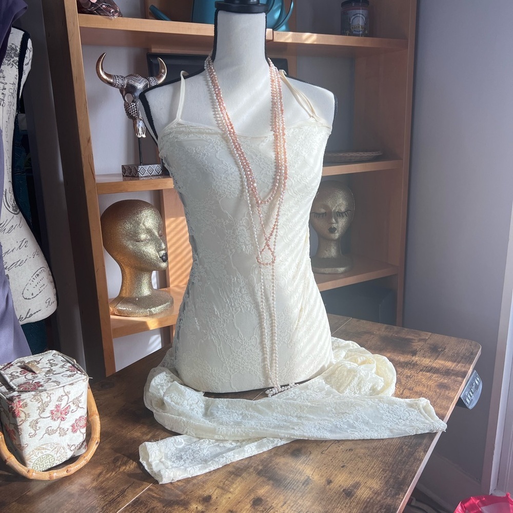 American apparel size medium/large lace spaghetti, strap, bodysuit.